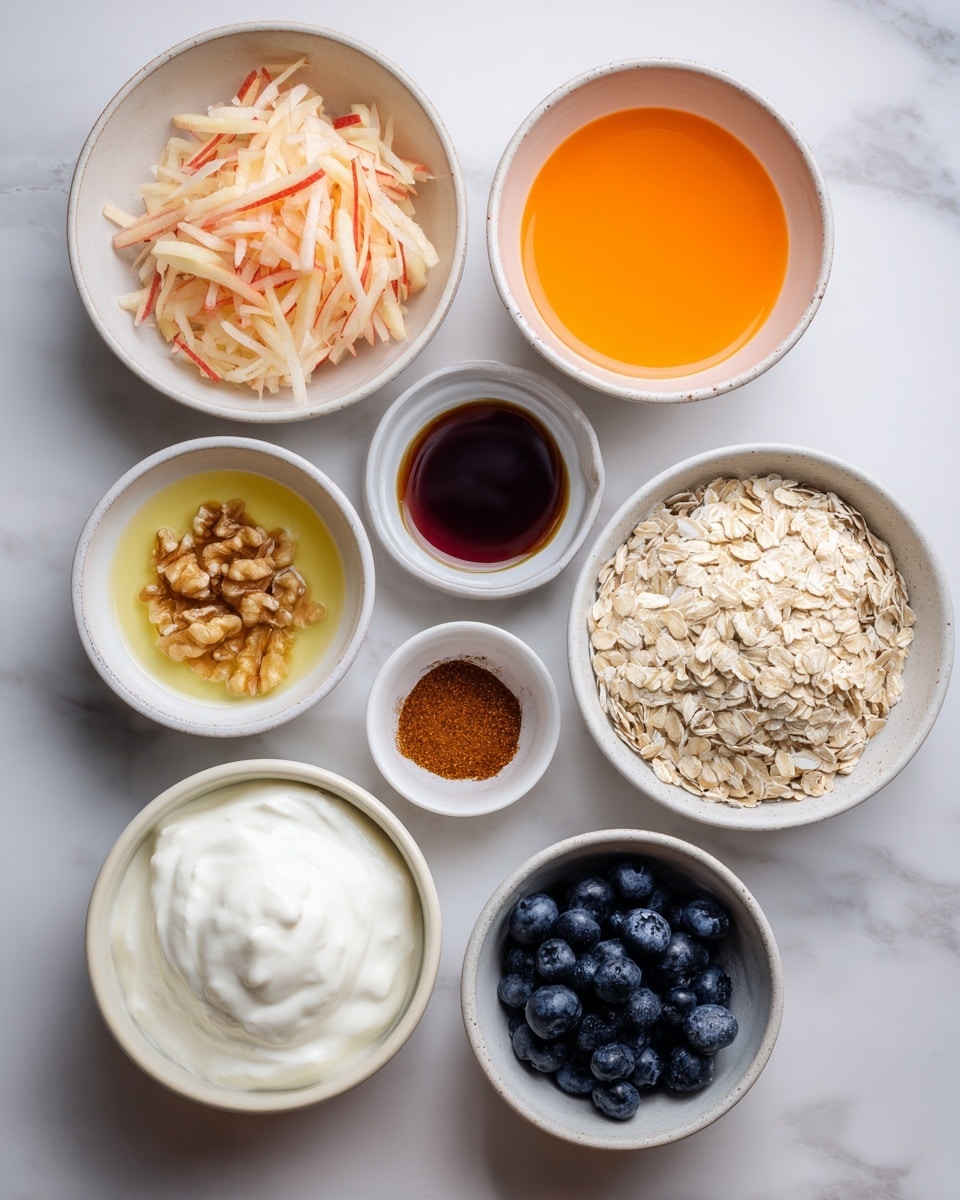 The image shows a top view of eight small white bowls arranged on a white marbled surface, each containing different ingredients. Starting from the top left, there is a bowl filled with pale red and white grated apple, next to it on the right is a bowl with bright orange liquid labeled orange juice. Below the grated apple bowl is one with chopped light brown walnuts. Beneath the walnuts, a small bowl contains light yellow lemon juice. In the center right, a larger bowl holds light beige rolled oats with flat, dry texture. To its right, a small bowl has dark brown maple syrup. Below the oats and syrup, a bowl is filled with smooth, white vegan Greek yogurt showing soft texture. Finally, in the bottom right, a bowl contains fresh dark blue blueberries. A small white bowl with brown cinnamon powder is in the center above the oats. Photo taken with an iphone --ar 4:5 --v 7
