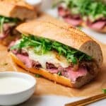 Prime Rib Sandwich with Caramelized Onions, Provolone, and Arugula Recipe