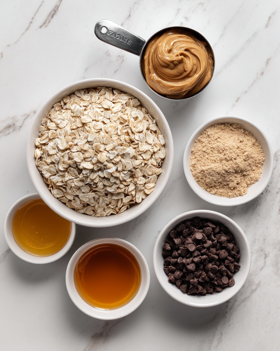 The image shows six separate white dishes placed on a white marbled surface with various ingredients organized neatly. At the top left is a metal measuring cup filled with smooth light brown peanut butter. Below it is a large white bowl filled with light beige rolled oats, showing a rough textured layered look. To the right of the oats, there is a small white bowl with off-white protein powder that has a fluffy, granular texture. Below that is a tiny white bowl holding golden brown vanilla extract with a glossy surface. At the bottom right, a medium white bowl is filled with dark brown chocolate chips, piled high with a matte finish. In the bottom left corner sits a small white bowl full of shiny amber honey, with thick liquid texture. The setup is simple and clear, focused on each ingredient separately. Photo taken with an iphone --ar 4:5 --v 7