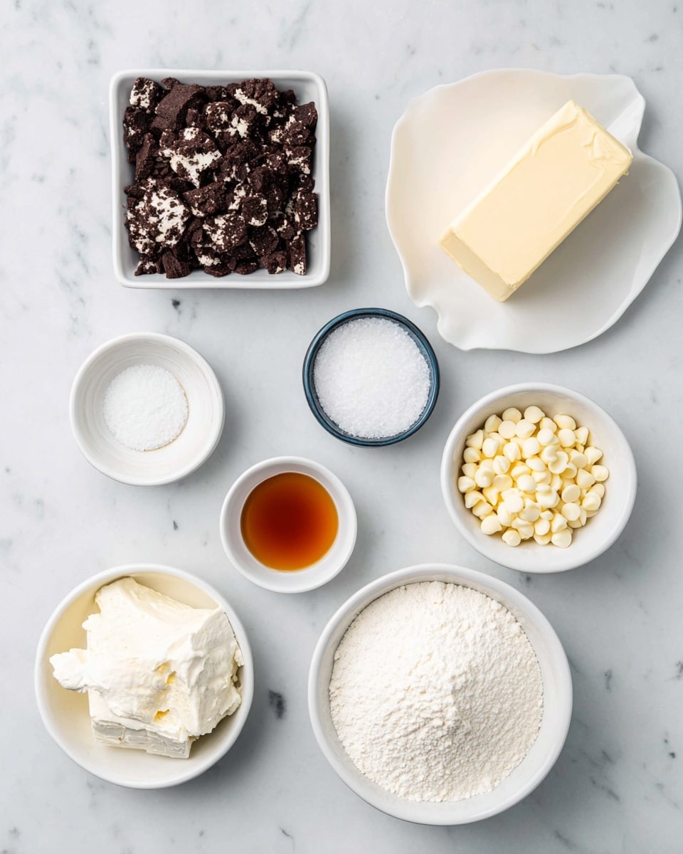 Several small white dishes are placed on a white marbled surface. One square white dish holds crushed chocolate cookie pieces, showing dark brown with white specks. Nearby, a round white dish is filled with a powdery white flour. Another white dish contains small white chocolate chips. There is a small white container holding granulated white sugar, and another with a thick, creamy white substance. A small round white bowl holds a dark amber liquid, likely vanilla extract. A white plate holds a block of cream cheese, while a stick of pale yellow butter wrapped in paper is also placed on the surface. A small white bowl contains a fine white powder, probably salt. photo taken with an iphone --ar 4:5 --v 7