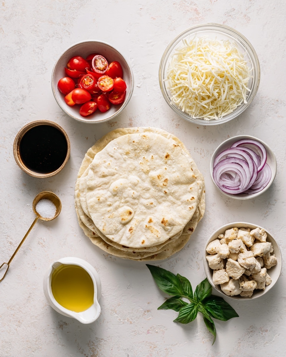 A top view of arranged ingredients on a white marbled texture surface including a stack of pita rounds in the center with a light beige color and soft texture, a white bowl of shredded mozzarella cheese with fine white strands in the top left, a small white bowl of bright red cherry tomatoes cut in halves at the bottom left, a small white cup of golden olive oil below the pita, a gold measuring spoon holding dark balsamic glaze to the left of the pita, a clear bowl of cooked chicken pieces with golden brown and white colors in the top right, a clear bowl of thin sliced red onion with pale purple and white stripes at the bottom right, a small gold spoon filled with flaky white salt above the chicken, and a small bunch of fresh green basil leaves near the chicken on the right photo taken with an iphone --ar 4:5 --v 7