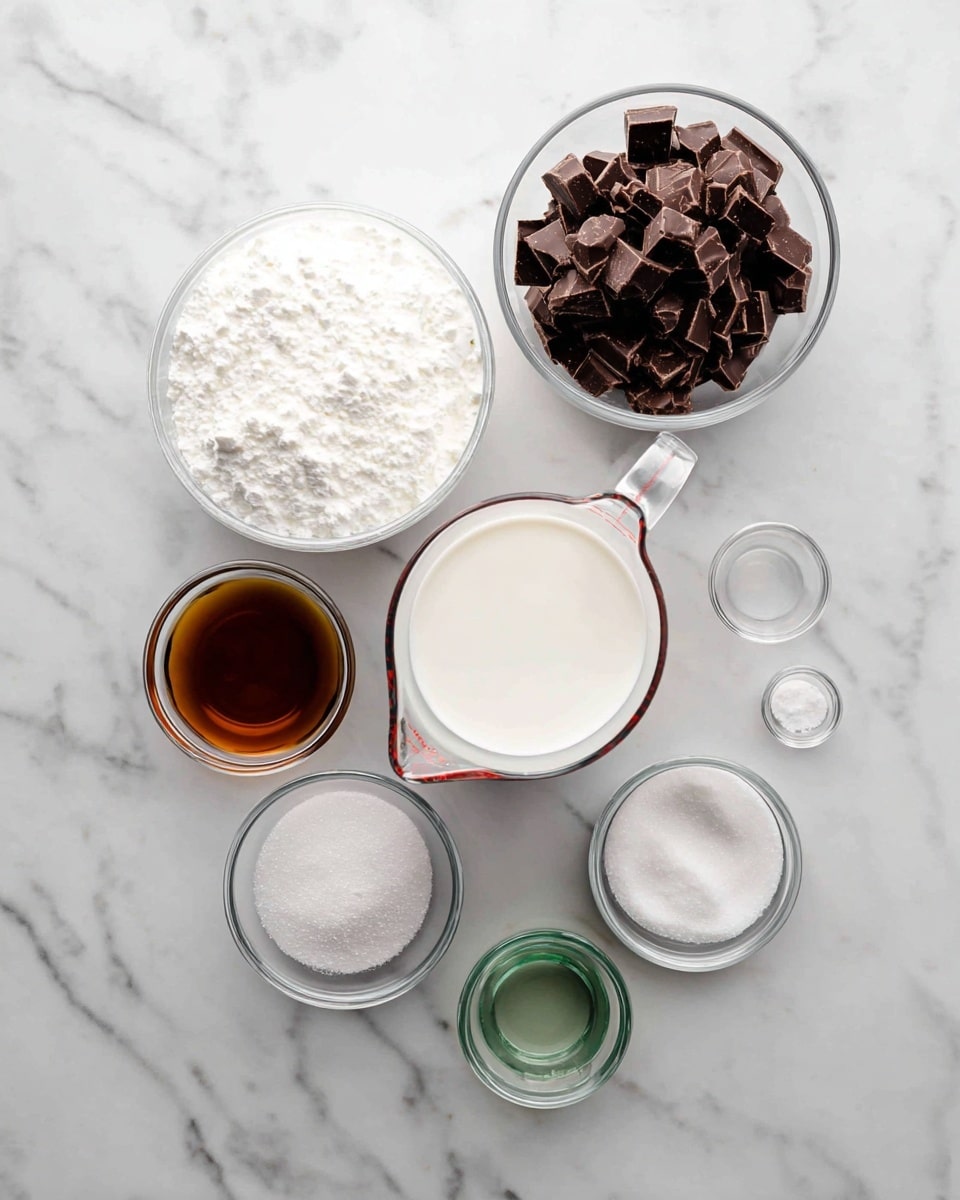The image shows seven clear glass bowls and measuring cups arranged on a white marbled surface. The largest bowl is filled with dark brown chocolate chunks, placed near the top right. Below it and to its left is a large measuring cup filled with white foamy cream, and to the right of that is a smaller measuring cup filled with smooth white milk. Above the milk is a small bowl with a brown liquid, possibly vanilla extract. Below the cream is a small bowl with white granulated sugar, and to its right is a small bowl with a green liquid. Finally, near the center of the image is a very small clear bowl with a white powder, likely salt. All the containers are transparent and the colors of the ingredients stand out clearly against the white marbled surface. Photo taken with an iphone --ar 4:5 --v 7