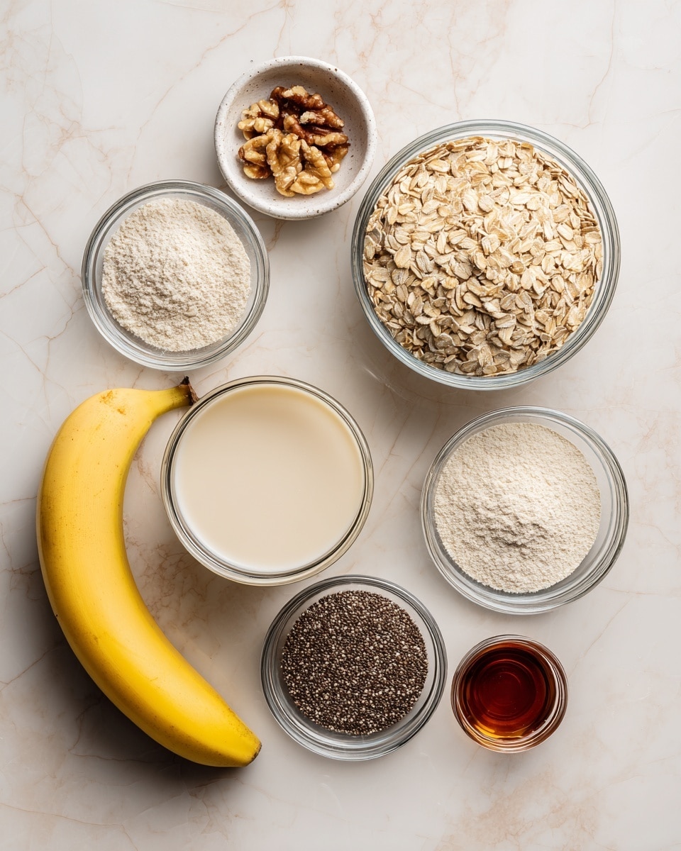 A photo showing a group of ingredients arranged on a white marbled surface. In the top left is a small white bowl filled with brown walnut pieces, next to a larger clear bowl of light tan oats on the upper right. Below the walnuts, there is a small clear bowl with fine white powder labeled collagen. To the right of that, a bright yellow banana is placed horizontally. Under the banana, a medium clear bowl holds a light beige liquid labeled milk. Near the bottom left, a small clear bowl contains a light golden liquid noted as agave, and next to it is a small bowl with brown vanilla extract. At the bottom right, a small clear bowl has black and white chia seeds. There is also a small clear bowl with white baking powder near the middle left. All items are neatly spaced out on the clean white marbled background. Photo taken with an iphone --ar 4:5 --v 7