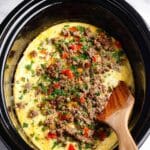 Crockpot Breakfast Casserole with Tater Tots, Sausage, Peppers, and Cheddar Recipe