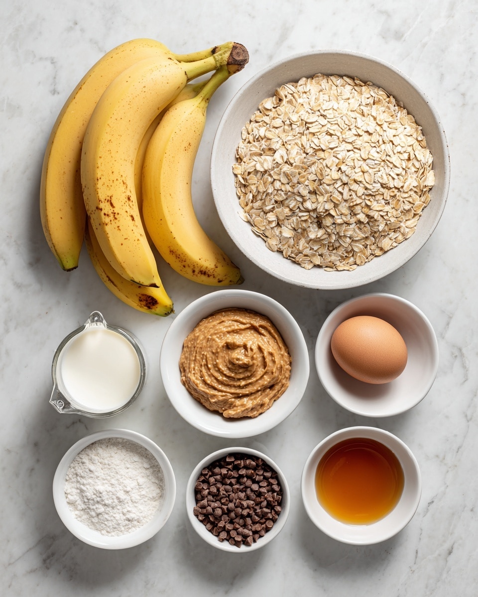 A flat lay shows ingredients arranged neatly on a white marbled surface. At the top right, there is a large white bowl filled with beige rolled oats, its texture rough and dry. To the left, a bunch of five yellow bananas with small brown spots and dark tips lie together. Below the oats, smaller white bowls hold light brown soft brown sugar, smooth light brown peanut butter, and tiny dark brown mini chocolate chips with a rough texture. A glass measuring cup with white milk sits near the bottom left. A small white bowl contains a mix of white baking powder, white salt, and brown cinnamon powder. A white raw egg with a smooth shell rests near the center. Lastly, a small white bowl with amber-colored vanilla extract with a smooth shiny surface is placed near the middle right. Photo taken with an iphone --ar 4:5 --v 7