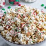 White Chocolate Christmas Popcorn with Peanuts, Marshmallows, and Festive Drizzles Recipe